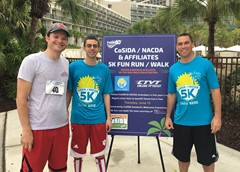 The Goodwill and Wellness Committee leaders of the annual 5K run/walk and community service event: Ryan Davis (Missouri Valley Conference);  Jeremy Rosenthal (Indiana) and committee chair Chris Mitchell (Washington-St. Louis).